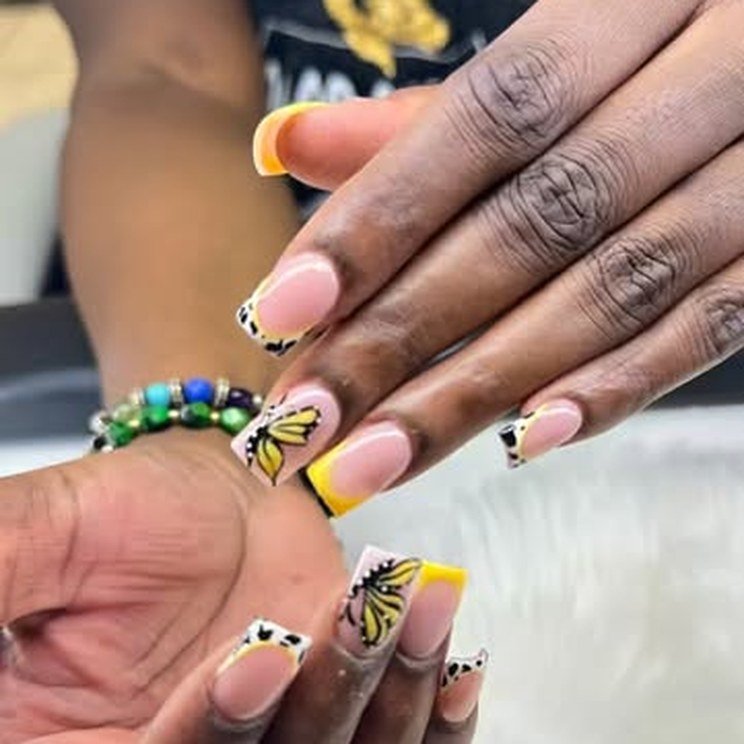 Yellow and black butterfly nail art