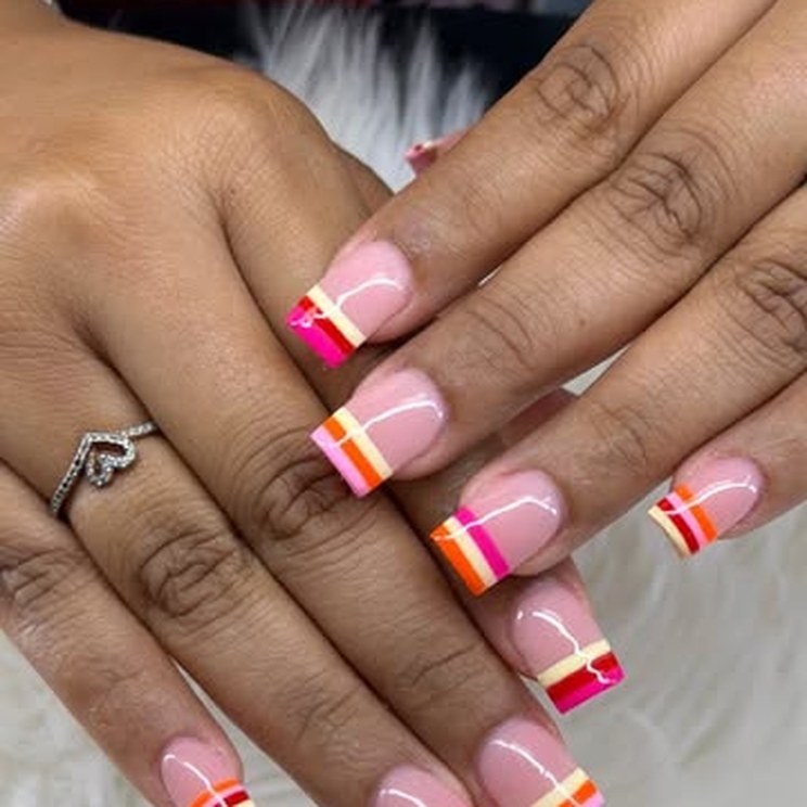 Pink and orange striped French tips